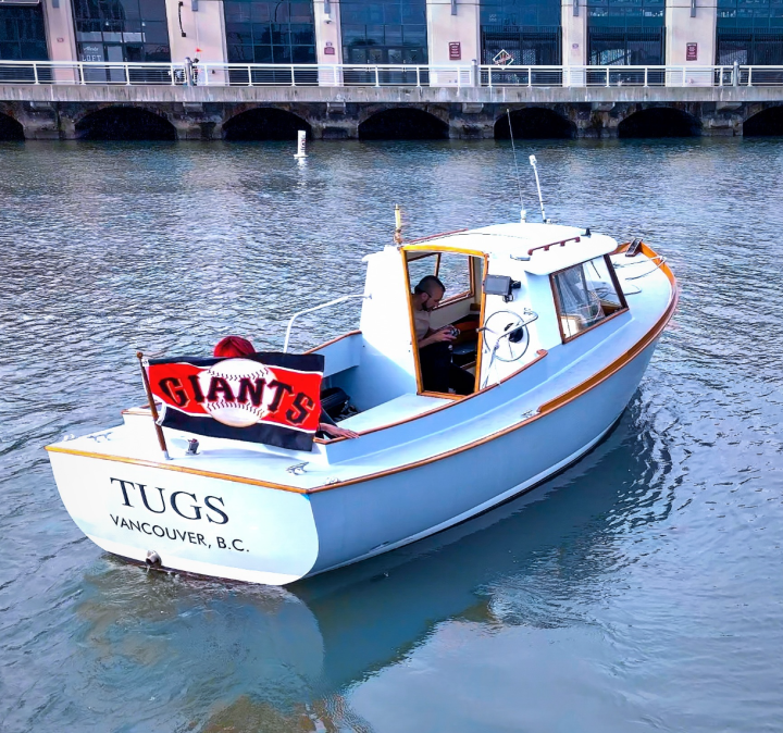 Tugs in McCovey Cove cheering on the San Francisco Giants