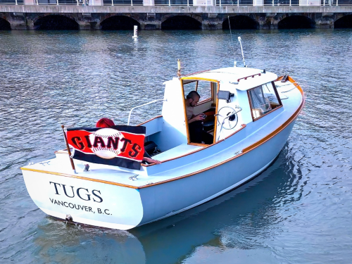 Tugs in McCovey Cove cheering on the San Francisco Giants